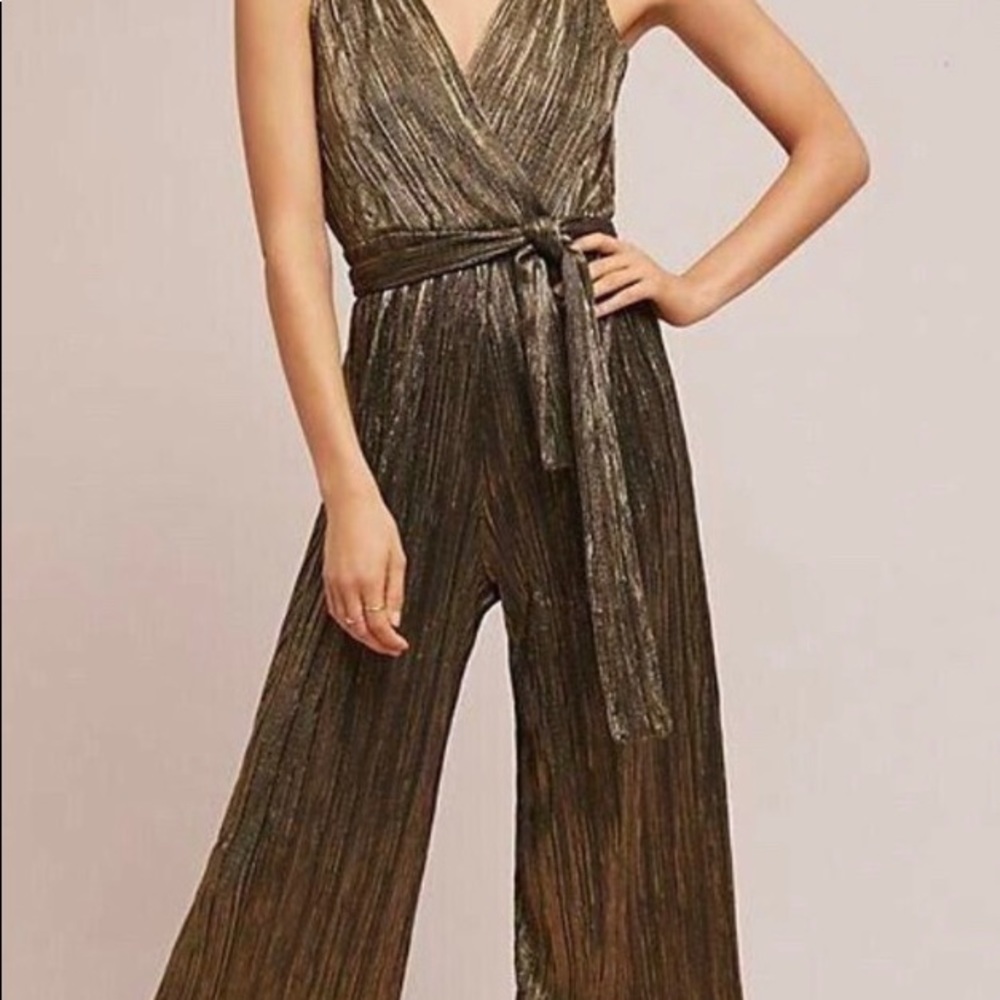 New, never worn, Anthropologie metallic jumpsuit. Size XL.